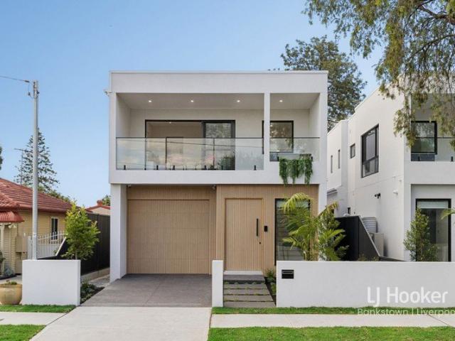 Architecturally Designed Luxury Home with Resort Style Pool & Alfresco Living