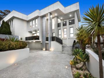 Architecturally Designed Luxury with Resort Style Living in a Premier Cul de sac