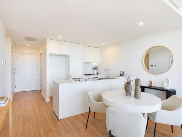 Architecturally Designed Residences Moments from Beaches, Retail, and Marina Precinct