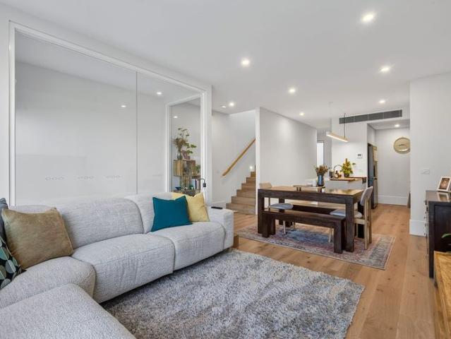 Architecturally Designed Tri Level Townhouse with Expansive Rooftop Terrace