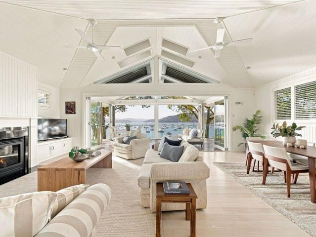 Architect designed coastal sanctuary with breathtaking bay views