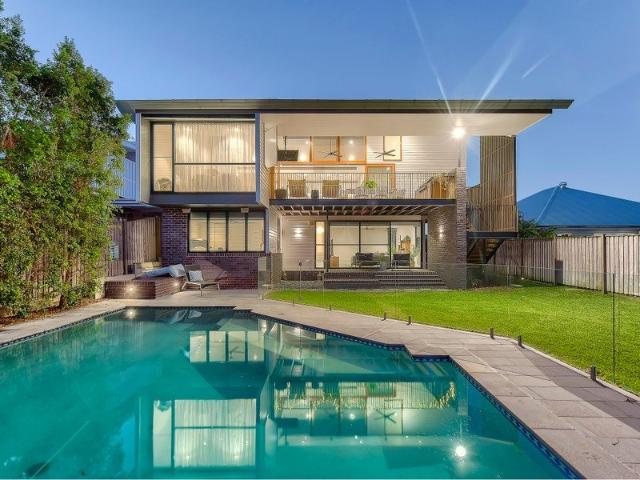 Architect Designed Elegance A Queenslander Reimagined with Soaring Ceilings and Elevated Views