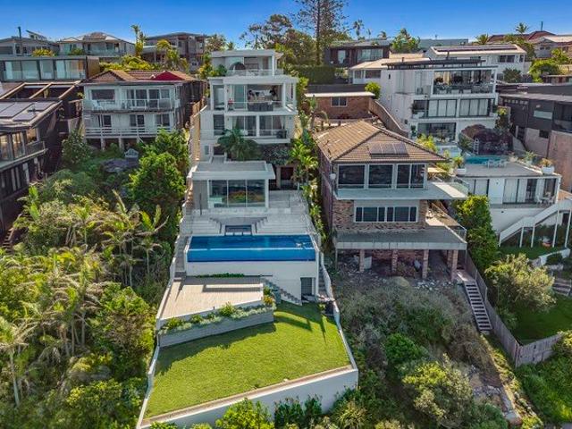 Architect designed headland masterpiece with endless ocean views