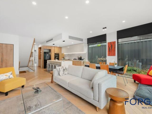 Architect Designed Luxury Town Residence with Wine Cellar and Double Garage in Brighton East