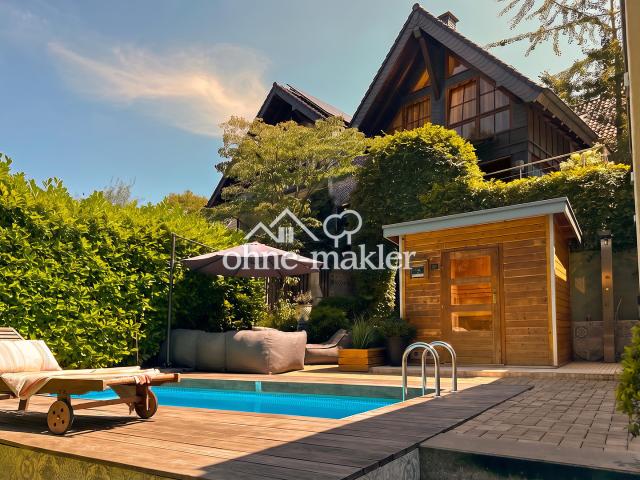Architektur trifft Privatsphäre – besonderes Einfamilienhaus mit Pool, Sauna und Garten im Grünen