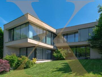 Architektur trifft Privatsphäre – exklusives Privatdomizil mit Wellnessbereich, Salzwasserpool in einer grünen Garten Oase!