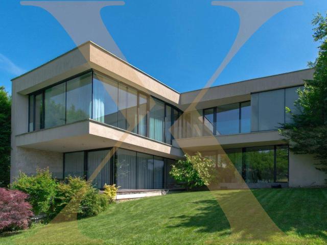 Architektur trifft Privatsphäre – exklusives Privatdomizil mit Wellnessbereich, Salzwasserpool in einer grünen Garten Oase!