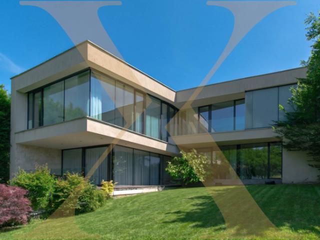 Architektur trifft Privatsphäre – exklusives Privatdomizil mit Wellnessbereich, Salzwasserpool in einer grünen Garten Oase!