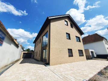 Architektur auf höchstem Niveau Exklusives Zweifamilienhaus mit High End Ausstattung & stilvoller Ästhetik