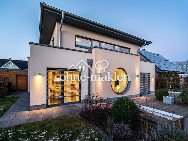 Architektenhaus in moderner Staffelgeschoss Bauweise