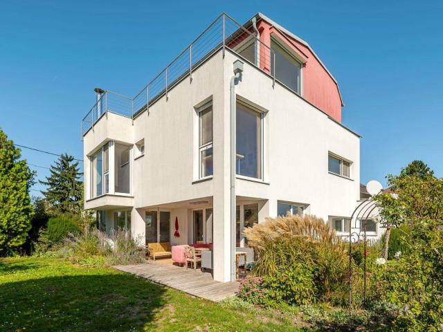 Architektenhaus mit unverbaubarem Grünblick Wohnen auf höchstem Niveau!