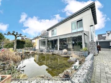 Architektenhaus und Mehrfamilienhaus auf großem Grundstück in gefragter Wohnlage