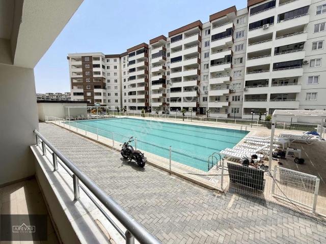 Arevar'dan Havuz Manzaralı Satılık 2+1 Bahçe Katı Daire