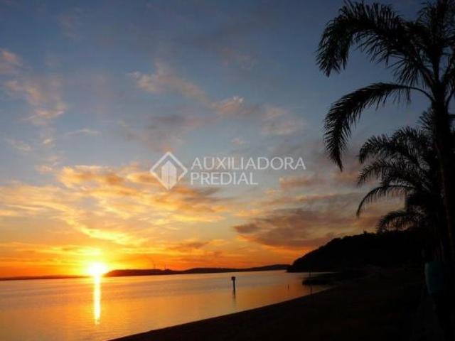 Área com casa de altissimo padrão a venda na Av Guaiba defronte ao Por do Sol do Guaiba