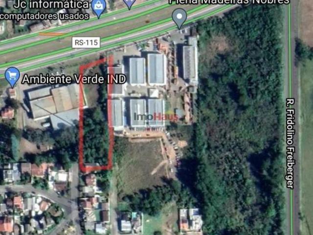 Área de terra na beira da ERS 115