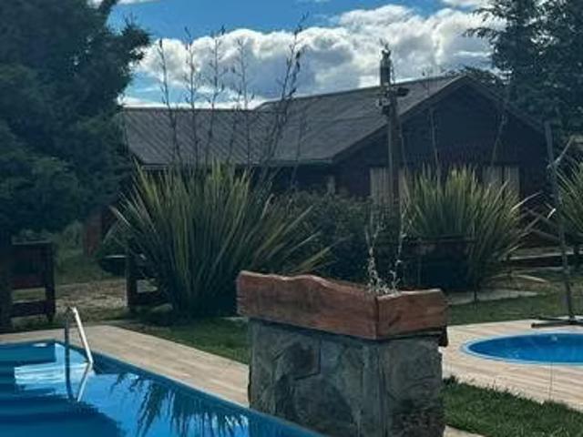Arriendo de Casas en Panguipulli | Se arrienda cabaña por año frente a piscina 2 Dormitorios por CLP 360000.00
