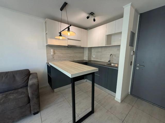 Arriendo departamento 2 dormitorios con estacionamiento