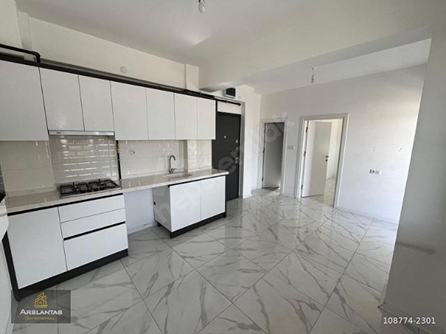 ARSLANTAŞ GAYRİMENKULden OSMANGAZİ MAH. SIFIR 1+1 60m BALKONLU YERDEN ISITMALI KİRALIK APART.