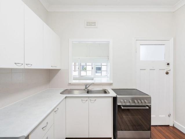 Art Deco Charm & Riverside Living in the Heart of New Farm