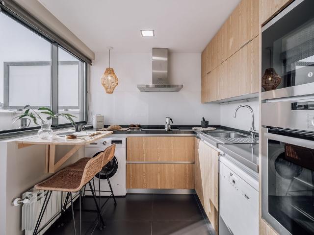 Artful 4 Bedroom Apartment with Two Terraces and Modern Workspace in Chamberi, Madrid Amsterdam Apartments for Rent