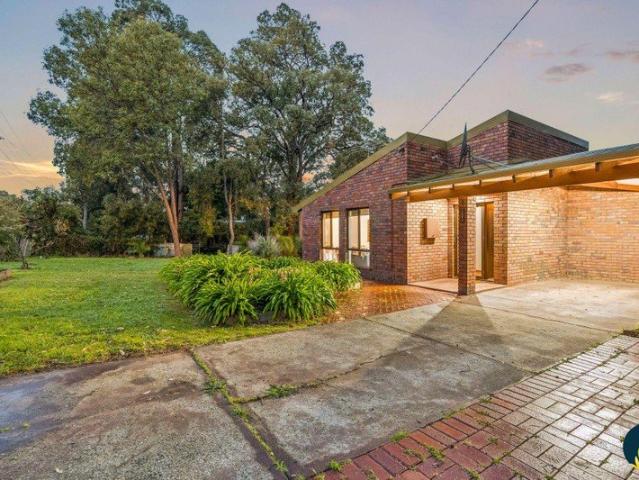 Award Winning Hills Charm on a Tranquil Half Acre
