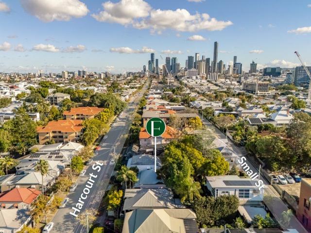 At the heart of the home is Queenslander Charm with Rare Dual Street Frontage & Future Potential