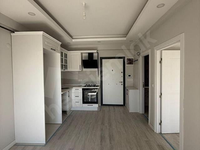 ATATÜRK MAH. HAVUZLU SİTEDE OTURUMA HAZIR 1+1 SATILIK DAİRE