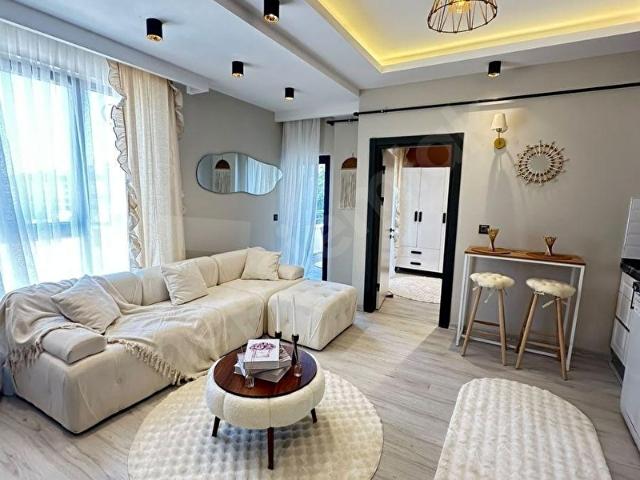 ATAKUMUN GÖZDE BÖLGESİ KÖRFEZDE HAVUZLU SİTEDE FULL EŞYALI 2+1