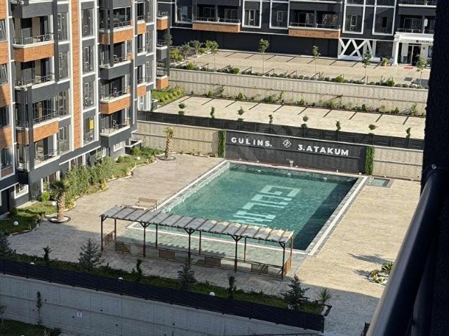 ATAKUMDA SİTE İÇİ DENİZ MANZARALI GENİŞ 1+1 DAİRE