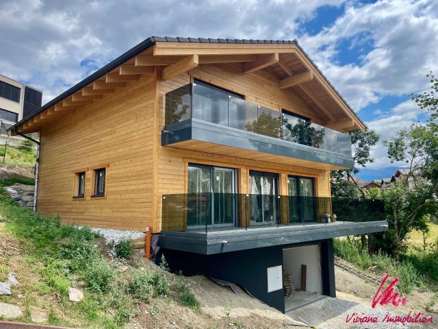 Atemberaubende Ausblicke nur wenige Schritte vom Dorfzentrum entfernt CHALET MIT GARTEN