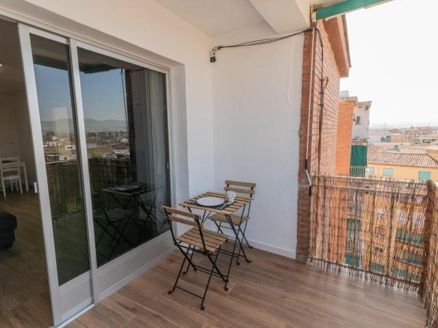 ÁTICO CON TERRAZA. VISTAS A GRANADA Y SIERRA NEVADA