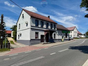 Atrakcyjny obiekt 200 m² z lokalami komercyjnymi i mieszkaniem