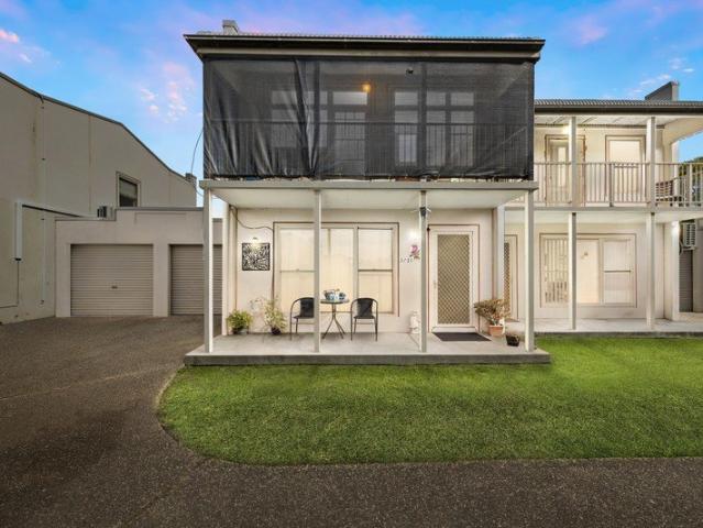 Attached villa with house like dimensions on easy care block