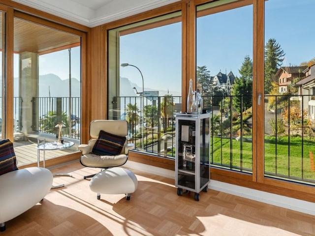 Attic apartment with lake view and high living comfort