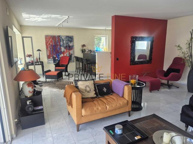 Attic flat with 4.5 rooms on sale in Brissago 143 m² | dreamo. Ch