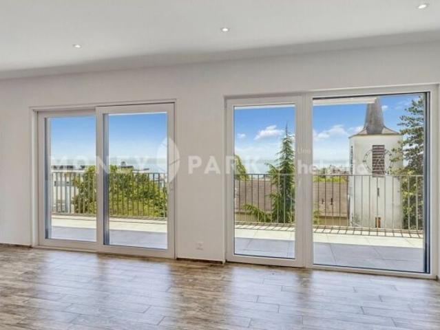 Attic flat with 4.5 rooms on sale in Neuchâtel 134 m² | dreamo. Ch
