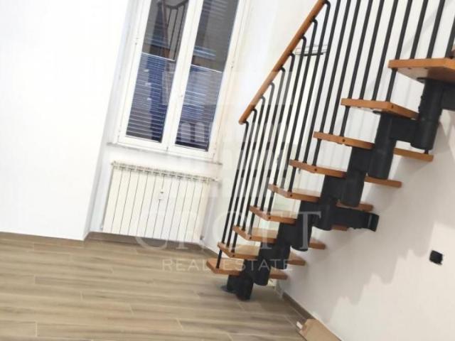 ATTIC PRATI: Renovated 2 bedroom, 2 bath, spacious living, new modern kitchen and baths, private terrace. Silent, sunny apartment in doorman building with elevator, walk to shops, services, metro. Ref 363