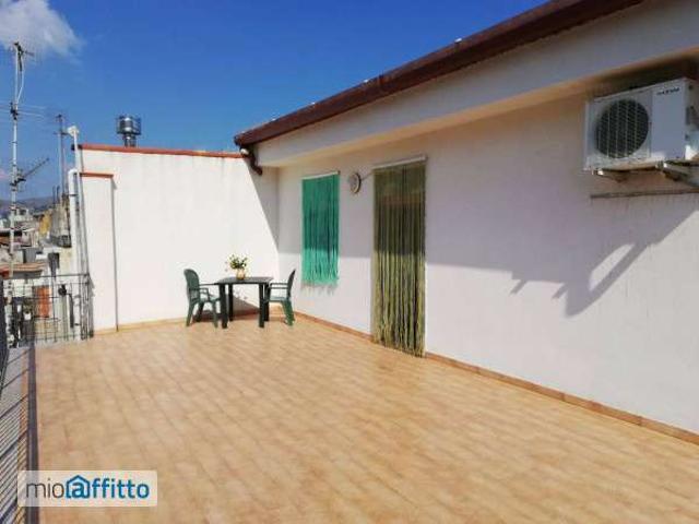 Attico arredato con terrazzo Limina