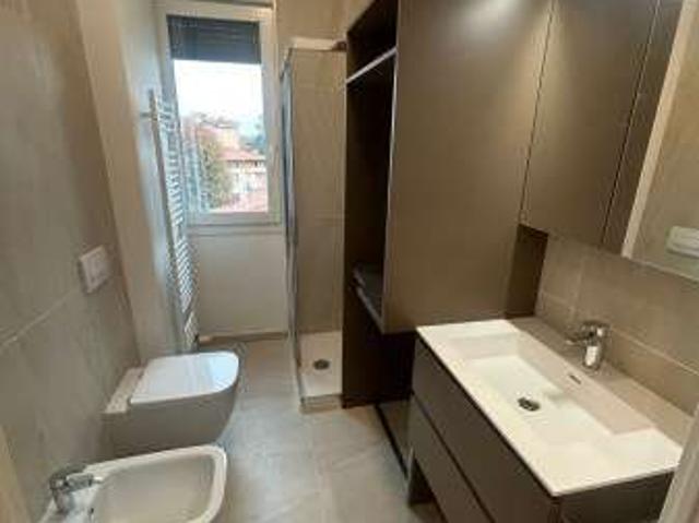 Attico arredato con terrazzo Rorai grande, grigoletti