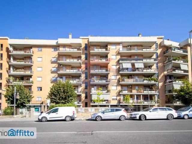 Attico arredato con terrazzo Saxarubra, labaro, prima porta