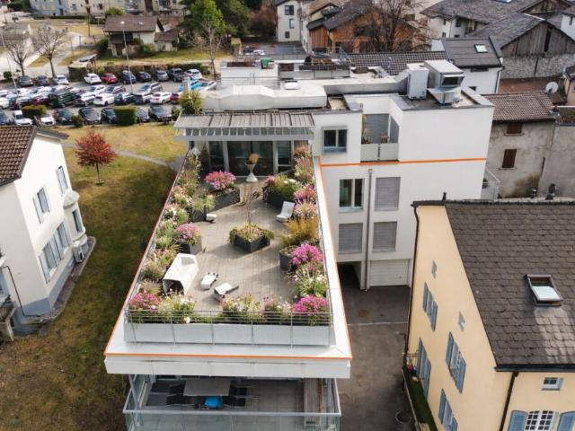 Attique dexception de 3.5 pièces avec terrasse panoramique avec garage