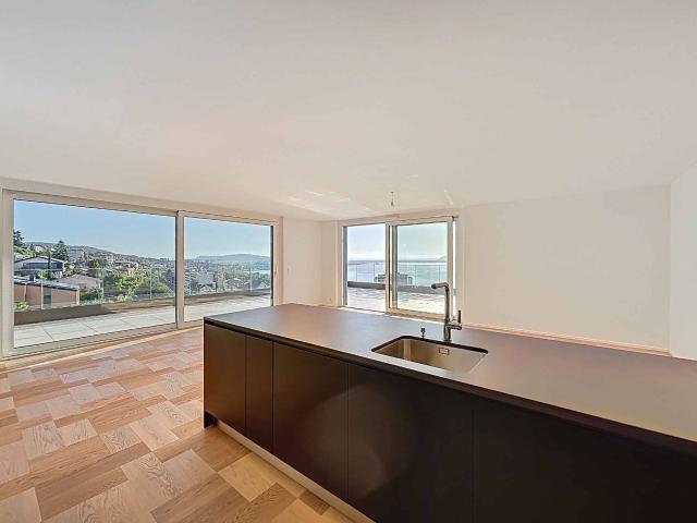 Attic flat with 3.5 rooms on sale in Neuchâtel 205 m² | dreamo. Ch