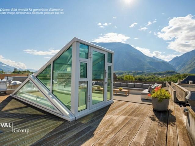 Attique en duplex avec terrasse sur le toit, au coeur de la ville