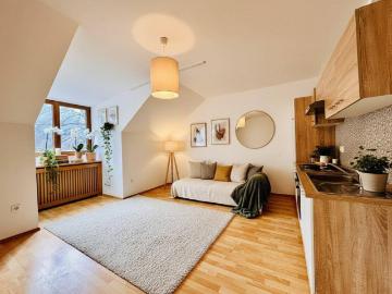 Attraktive, bereits vermietete 3 Zimmer Wohnung mit Garten ideales Anlageobjekt