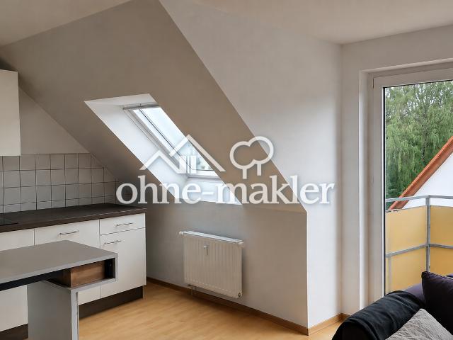 Attraktive Dachgeschosswohnung mit Balkon, Stellplatz und zusätzlichem Dachboden