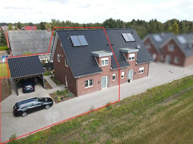 Attraktive Doppelhaushälfte mit Carport und Terrasse!