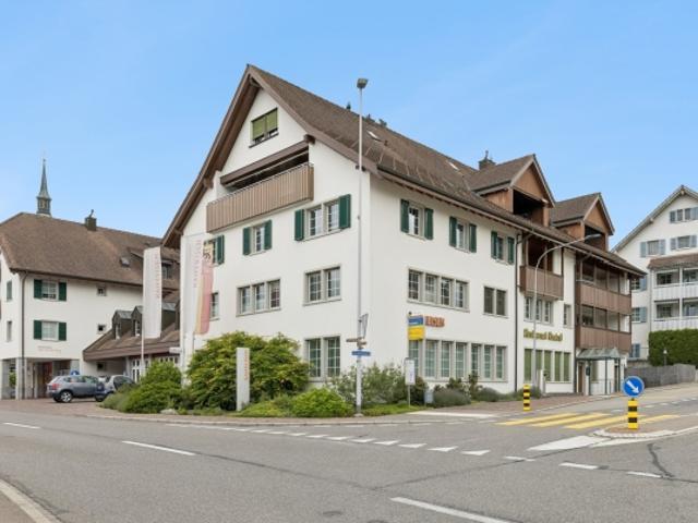 Attraktive Immobilie mit Wohnungen und Gewerbeflächen