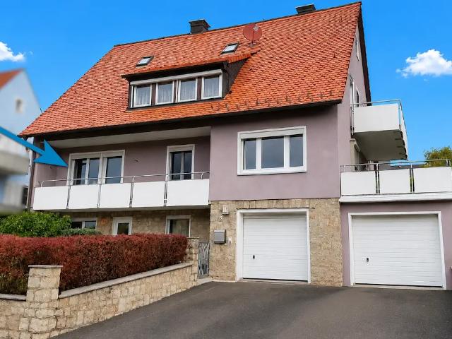 Attraktive Wohnung mit Garage und Garten