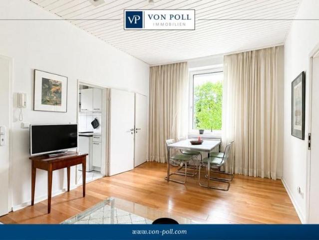 Attraktive Zwei Zimmer Wohnung mit Terrasse und Garten zur Mitnutzung