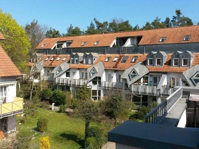 Attraktive 2,5 Zimmer Wohnung mit TG. Stellplatz und kleinem Gartenanteil